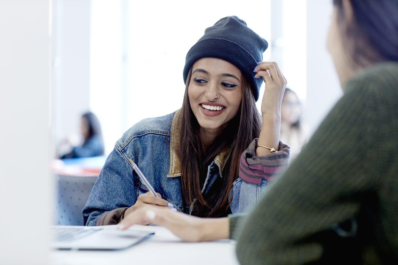 Happy student with friend